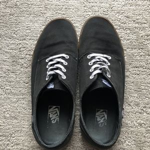 Black and brown Vans